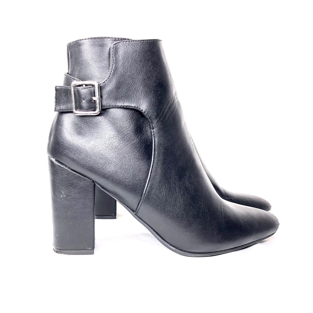 Black ankle boots with silver buckle detail